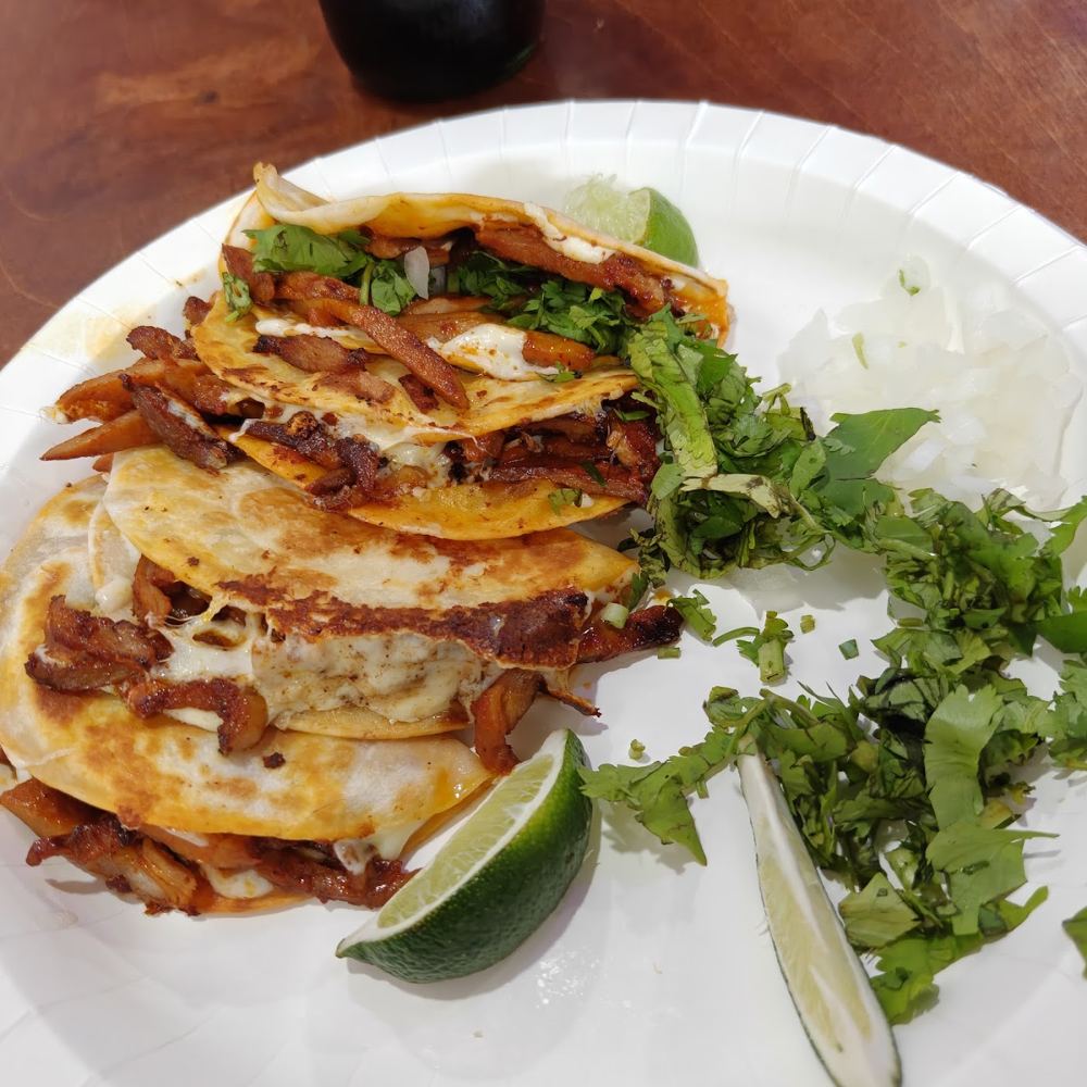 Plate of al pastor tacos